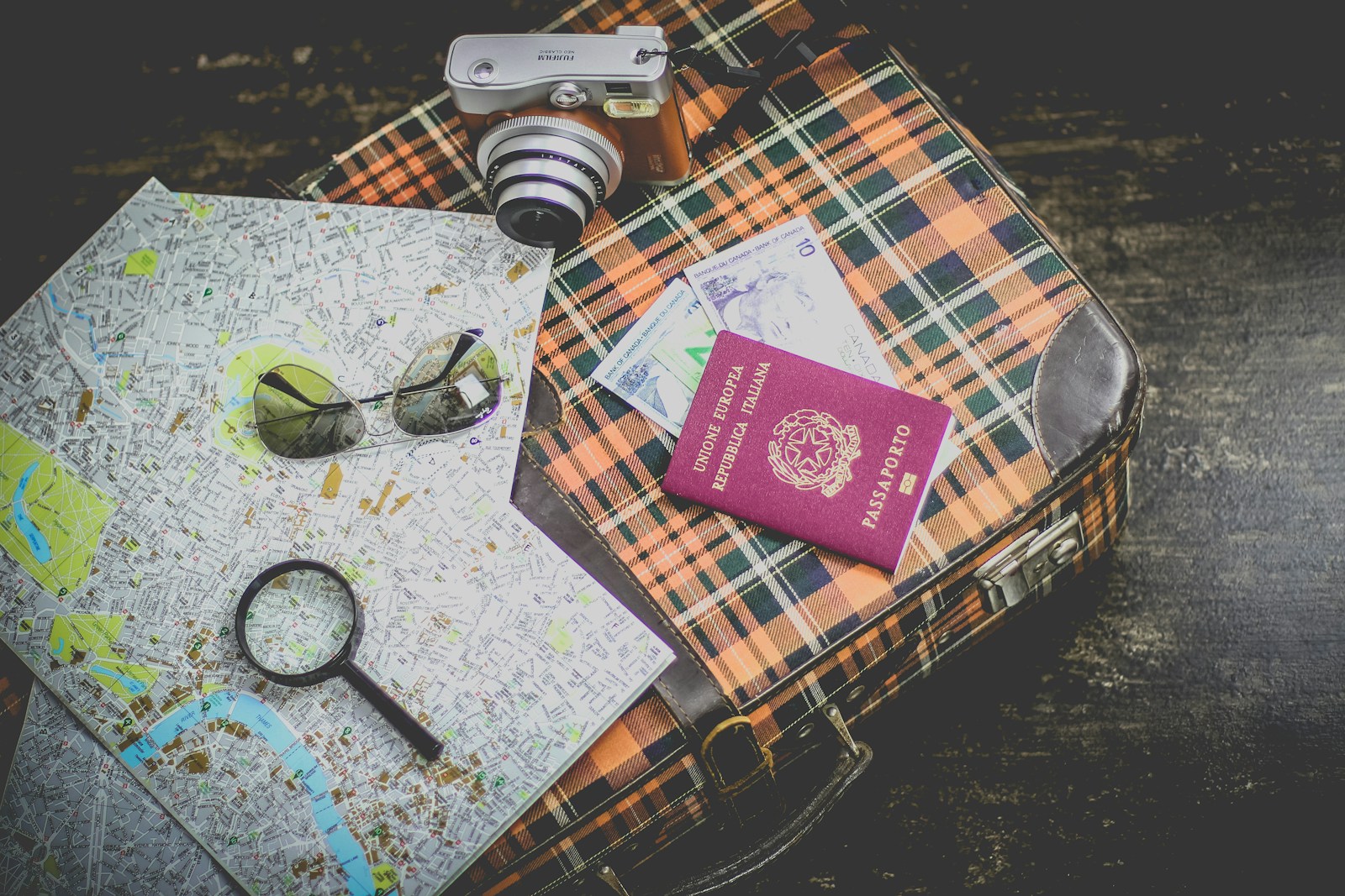 Flat lay of various anti-theft travel wallets including RFID blocking and slim designs