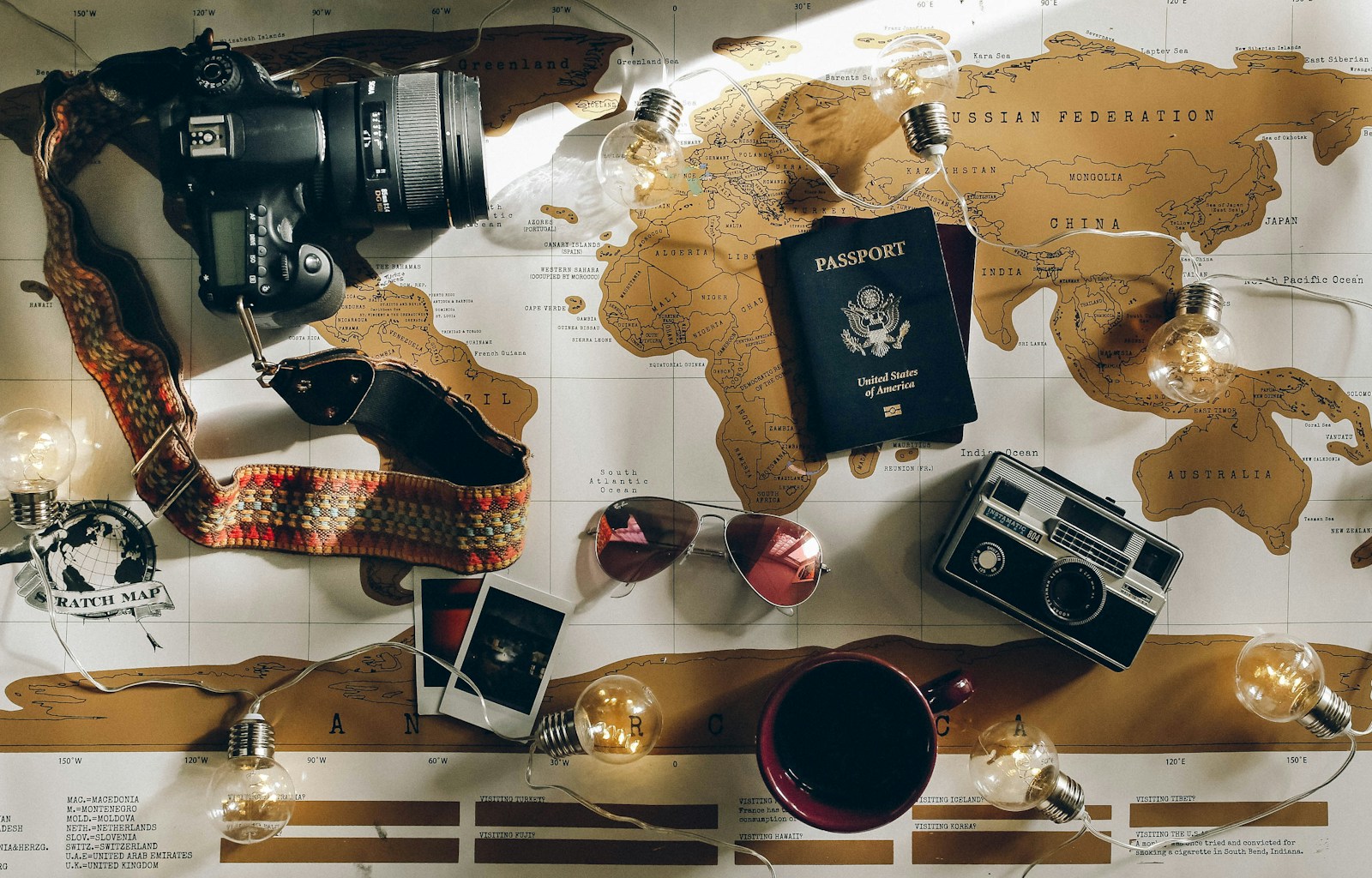 Travel accessories including a white noise machine and travel pillow for better hotel sleep
