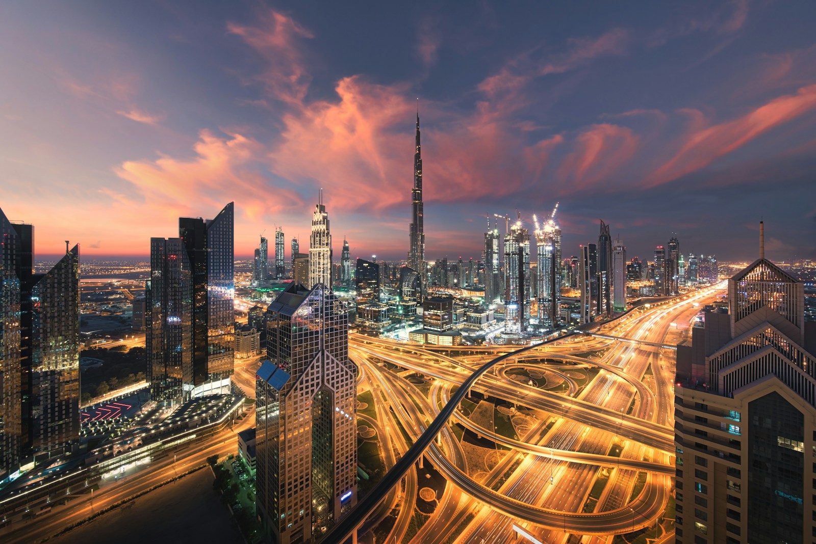 Dubai skyline at sunset with the Burj Khalifa in the background