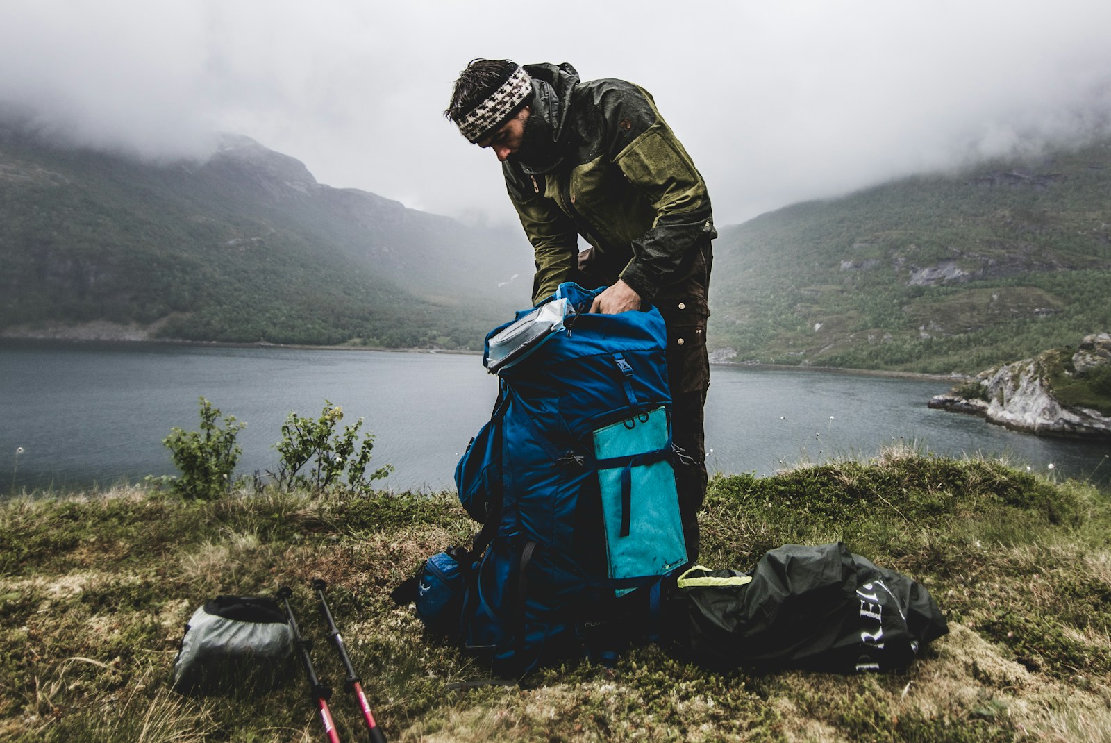 Osprey Farpoint 40 backpack opened in clamshell mode with clothes packed inside