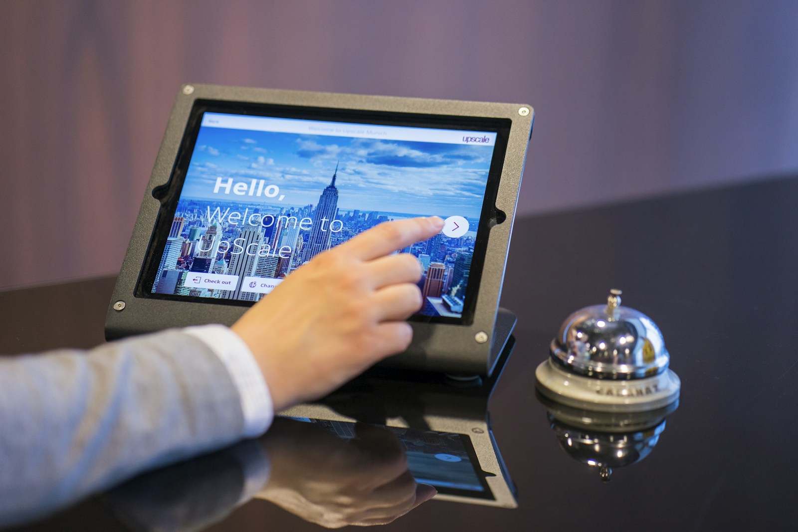 A smartphone display showing a last minute hotel booking app with discounted room rates