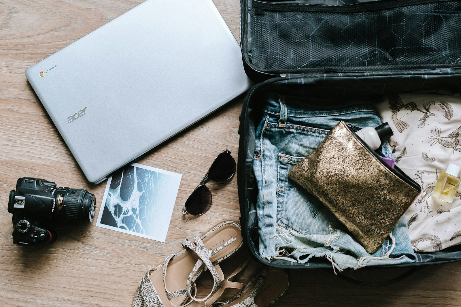 A happy couple booking a flight with a travel agent at a desk instead of using points